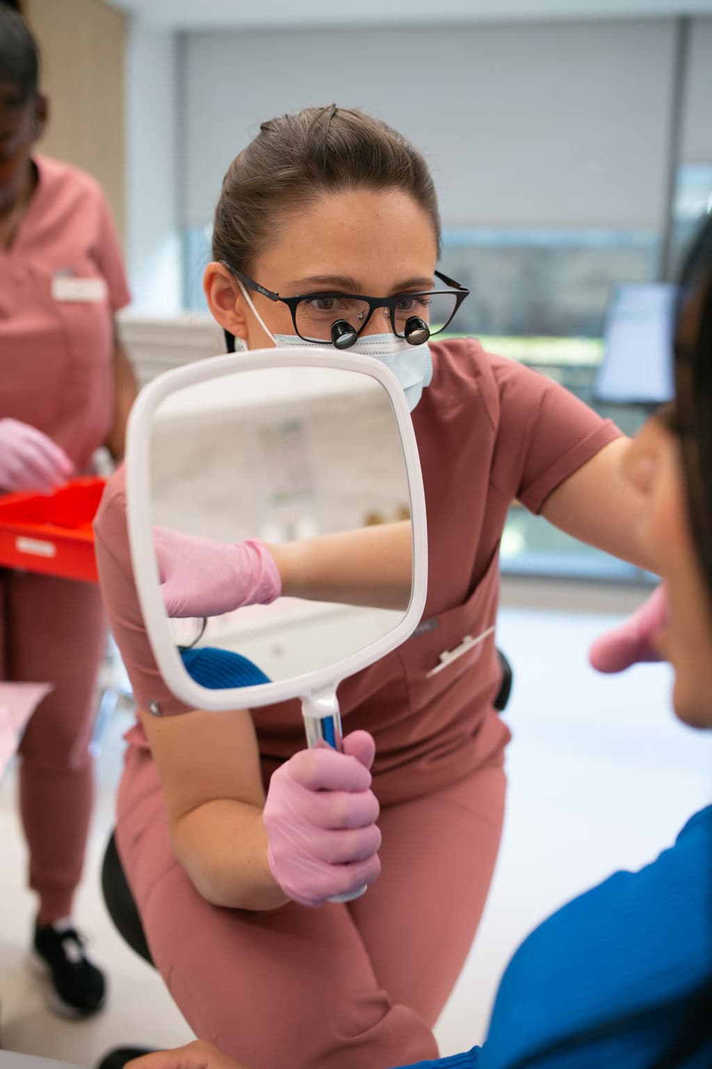 Dentist showing patient results at Vere Dental