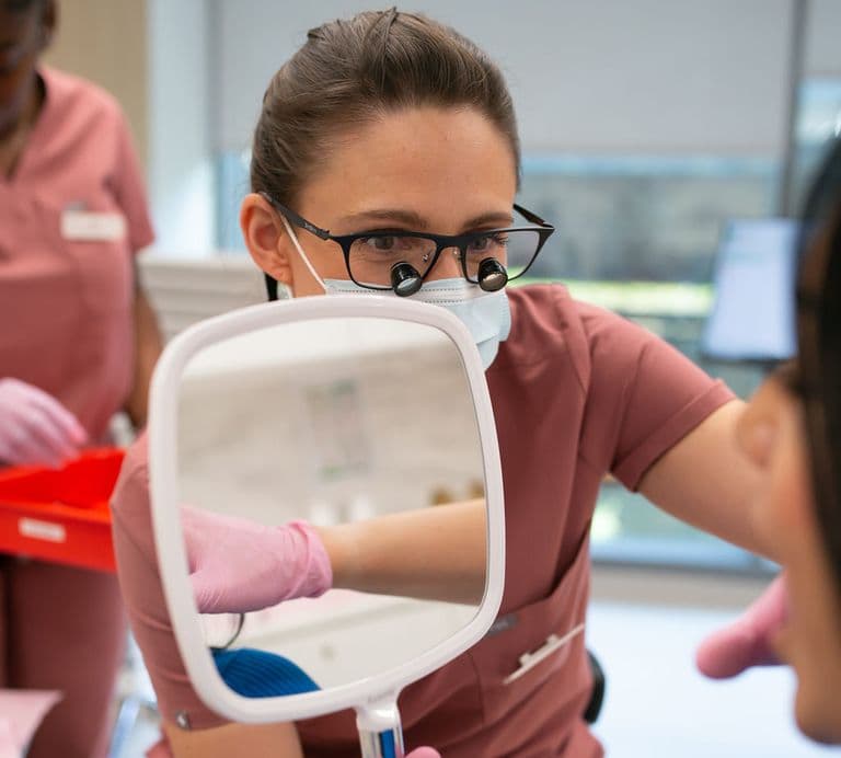 Dentist reviewing findings with patient at Vere Dental